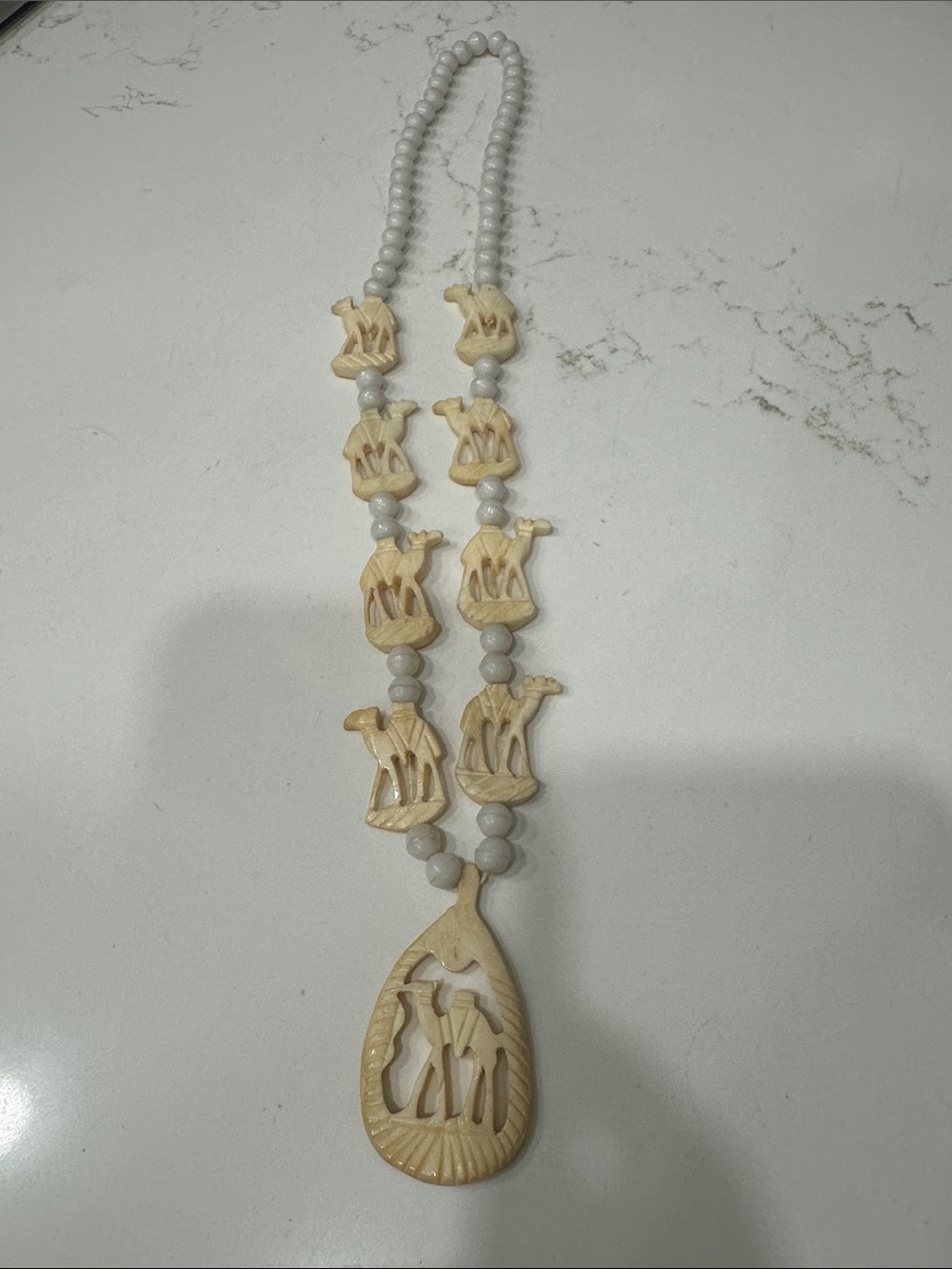 Hand-Carved Ivory-Tone Camel Pendant Necklace - Neutral
